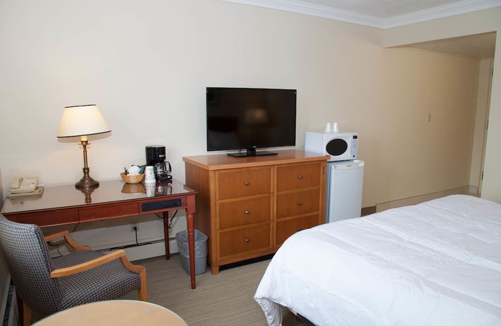 Imagen de la habitación del Hotel Twin Pine Inn and Suites. Foto 14