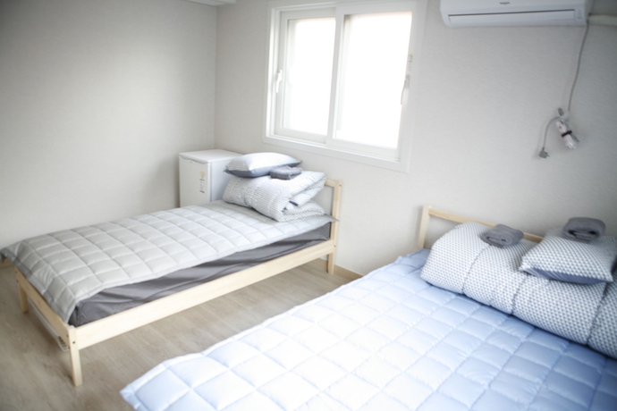 Imagen de la habitación del Hotel Twin Rabbit Guesthouse. Foto 9