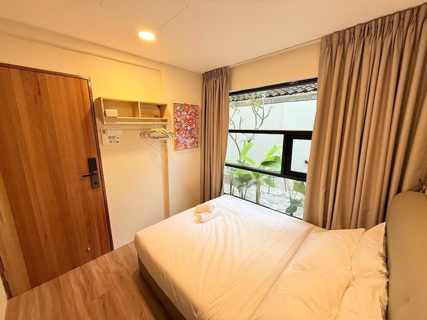 Imagen de la habitación del Hotel TwinTrees Kelawai. Foto 2