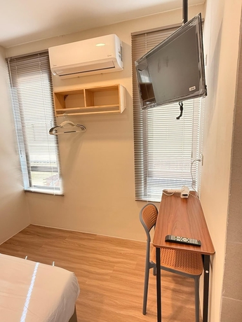 Imagen de la habitación del Hotel TwinTrees Kelawai. Foto 3