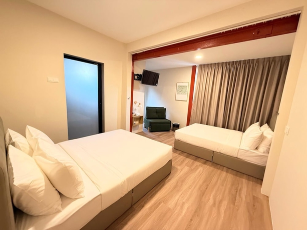 Imagen de la habitación del Hotel TwinTrees Kelawai. Foto 6