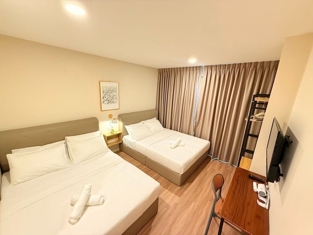 Imagen de la habitación del Hotel TwinTrees Kelawai. Foto 8