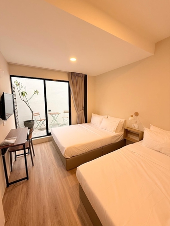 Imagen de la habitación del Hotel TwinTrees Kelawai. Foto 10