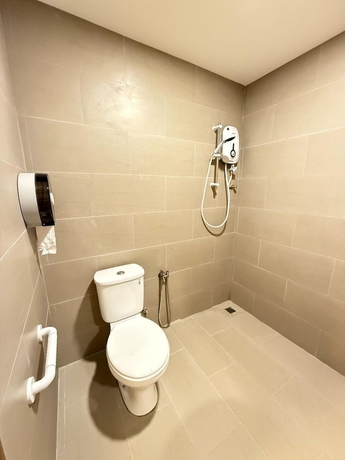 Imagen de la habitación del Hotel TwinTrees Kelawai. Foto 11