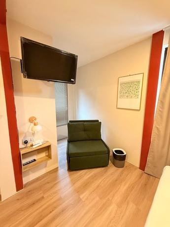 Imagen de la habitación del Hotel TwinTrees Kelawai. Foto 12