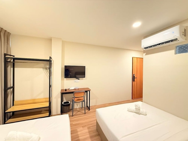 Imagen de la habitación del Hotel TwinTrees Kelawai. Foto 14