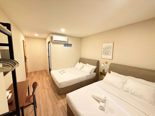 Imagen de la habitación del Hotel TwinTrees Kelawai. Foto 16