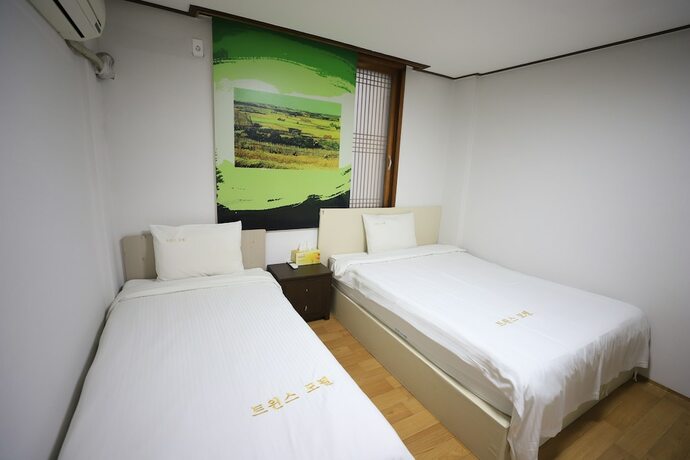 Imagen de la habitación del Hotel Twins, Jeju. Foto 20