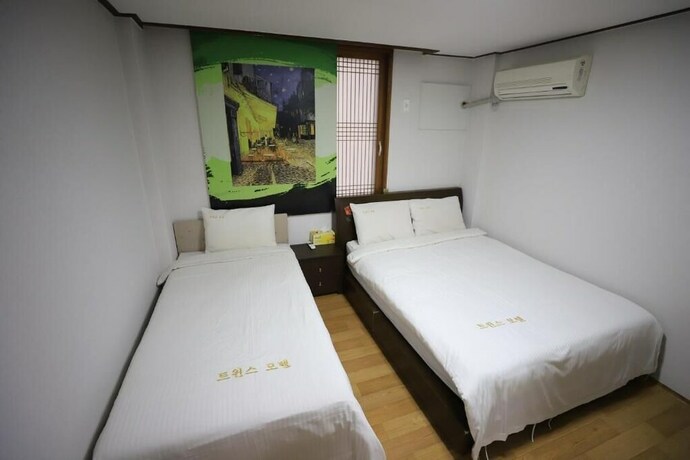 Imagen de la habitación del Hotel Twins, Jeju. Foto 32