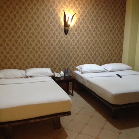 Imagen de la habitación del Hotel Twins Manggadua. Foto 3
