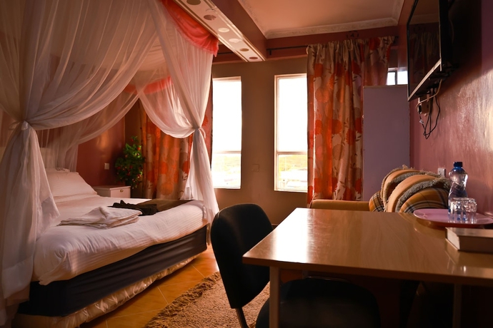 Imagen de la habitación del Hotel Twinspot Guest House. Foto 7