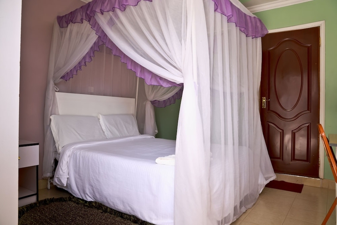 Imagen de la habitación del Hotel Twinspot Guest House. Foto 9