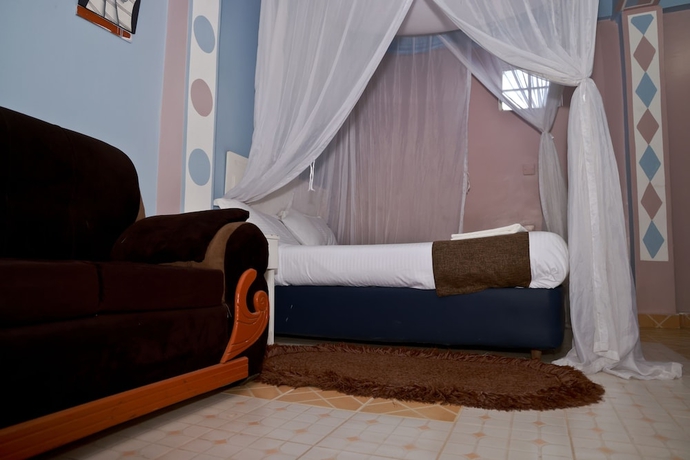 Imagen de la habitación del Hotel Twinspot Guest House. Foto 12