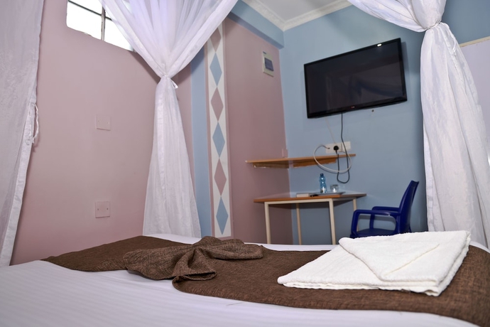 Imagen de la habitación del Hotel Twinspot Guest House. Foto 13