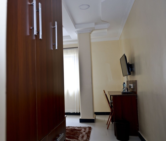 Imagen de la habitación del Hotel Twinspot Guest House. Foto 16
