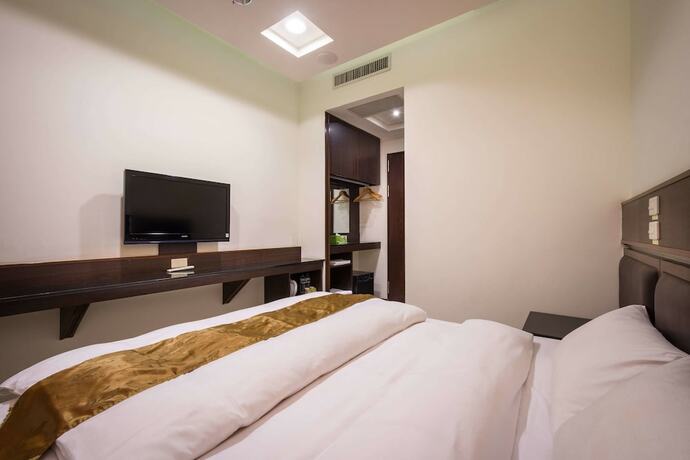 Imagen de la habitación del Hotel Twinstar. Foto 14