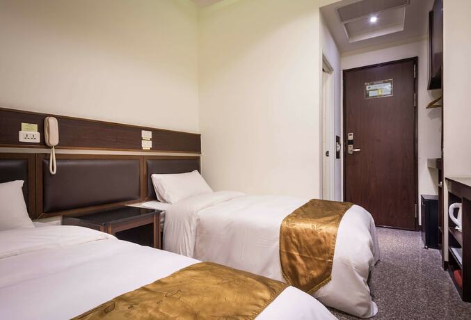 Imagen de la habitación del Hotel Twinstar. Foto 19