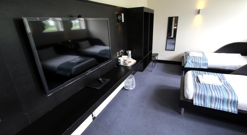 Imagen general del Hotel Twinwoods Guestrooms. Foto 7