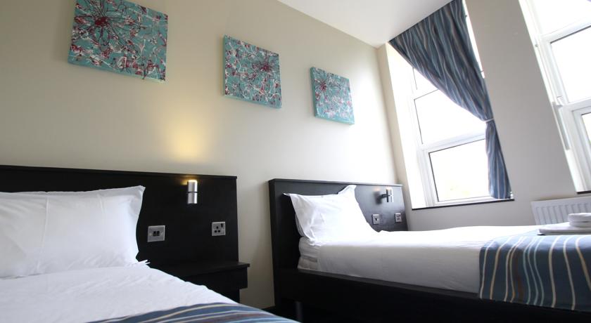 Imagen general del Hotel Twinwoods Guestrooms. Foto 8