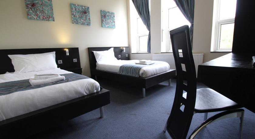 Imagen general del Hotel Twinwoods Guestrooms. Foto 9