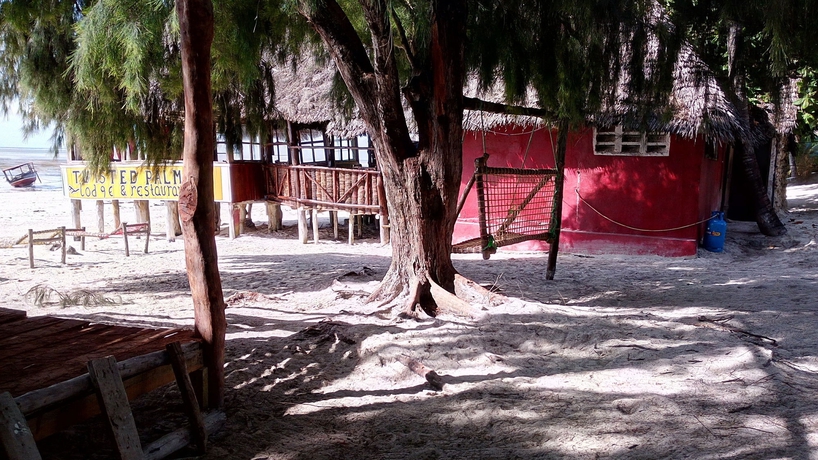 Imagen del bar/restaurante del Hotel Twisted Palms Lodge and Restaurant. Foto 3