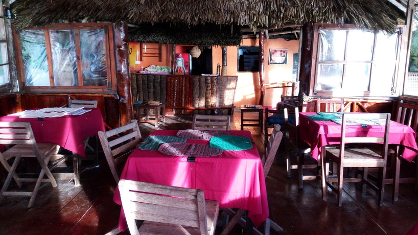 Imagen del bar/restaurante del Hotel Twisted Palms Lodge and Restaurant. Foto 7