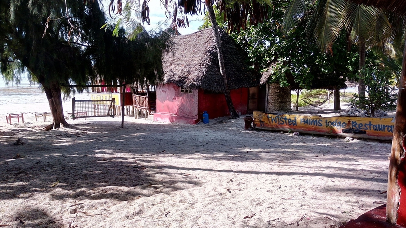 Imagen del bar/restaurante del Hotel Twisted Palms Lodge and Restaurant. Foto 8