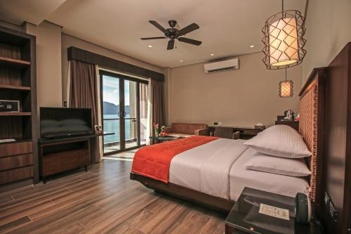 Imagen de la habitación del Hotel Two Seasons Coron Bayside. Foto 9