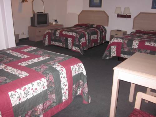Imagen de la habitación del Hotel Two Sunsets Hotel. Foto 4