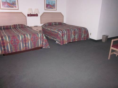 Imagen de la habitación del Hotel Two Sunsets Hotel. Foto 5