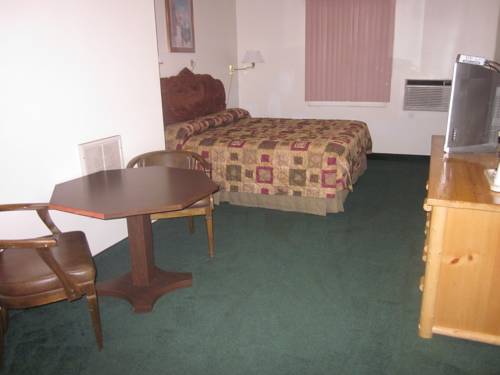 Imagen de la habitación del Hotel Two Sunsets Hotel. Foto 7