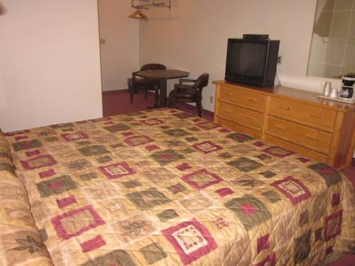 Imagen de la habitación del Hotel Two Sunsets Hotel. Foto 11