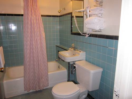 Imagen de la habitación del Hotel Two Sunsets Hotel. Foto 12