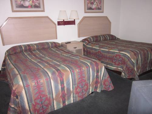 Imagen de la habitación del Hotel Two Sunsets Hotel. Foto 13