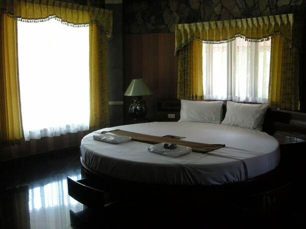 Imagen de la habitación del Hotel Two Tiger Resort and Spa. Foto 23