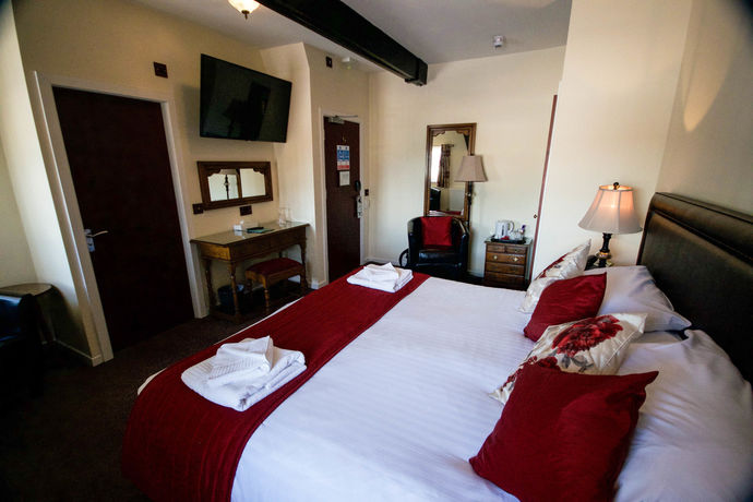 Imagen de la habitación del Hotel Ty Dre Town House. Foto 5