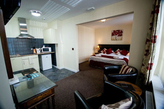 Imagen de la habitación del Hotel Ty Dre Town House. Foto 8