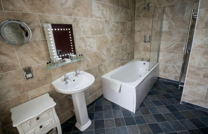 Imagen de la habitación del Hotel Ty Dre Town House. Foto 9