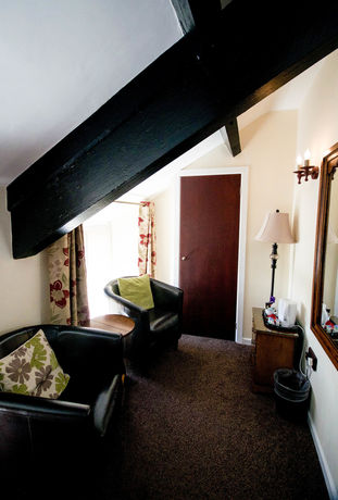 Imagen de la habitación del Hotel Ty Dre Town House. Foto 10