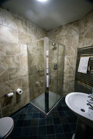 Imagen de la habitación del Hotel Ty Dre Town House. Foto 13