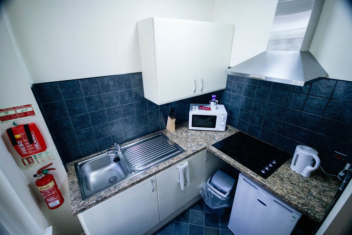 Imagen de la habitación del Hotel Ty Dre Town House. Foto 14