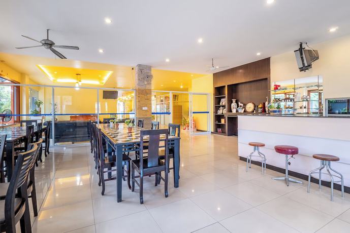 Imagen del bar/restaurante del Hotel Tycoon Place Garden. Foto 5