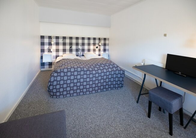 Imagen de la habitación del Hotel Tylstrup Kro og Motel. Foto 18