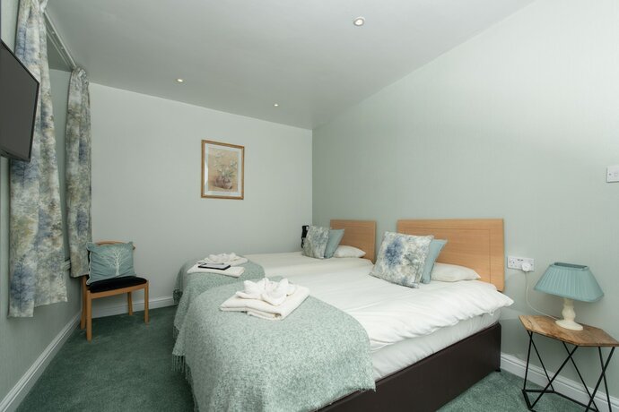Imagen de la habitación del Hotel Tyn-y-Coed. Foto 16