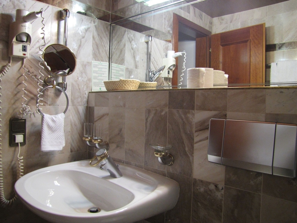 Imagen de la habitación del Hotel Tyrolis. Foto 12