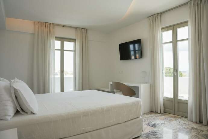 Imagen de la habitación del Hotel Tzanis Resort. Foto 17