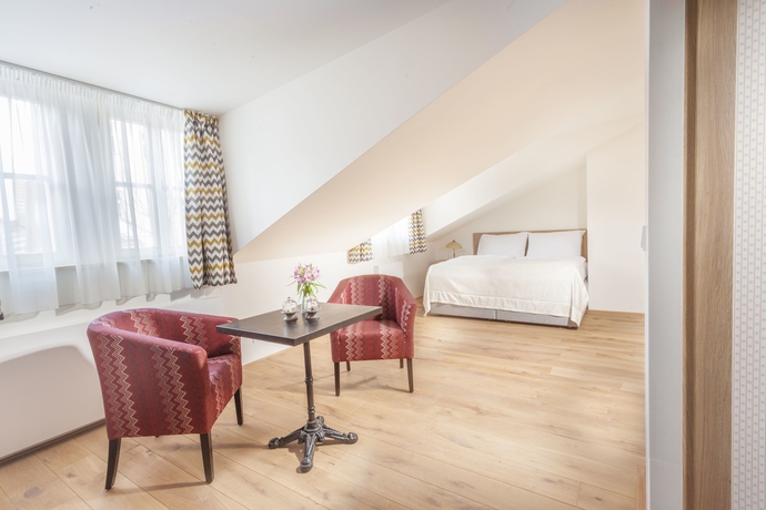 Imagen de la habitación del Hotel U Bílé Lilie. Foto 6