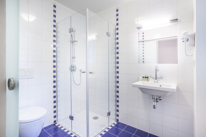 Imagen de la habitación del Hotel U Bílé Lilie. Foto 13