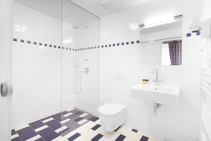 Imagen de la habitación del Hotel U Bílé Lilie. Foto 16