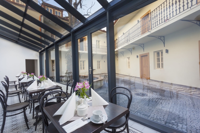 Imagen del bar/restaurante del Hotel U Bílé Lilie. Foto 2